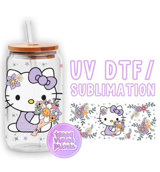 a hello kitty water bottle with a straw in it