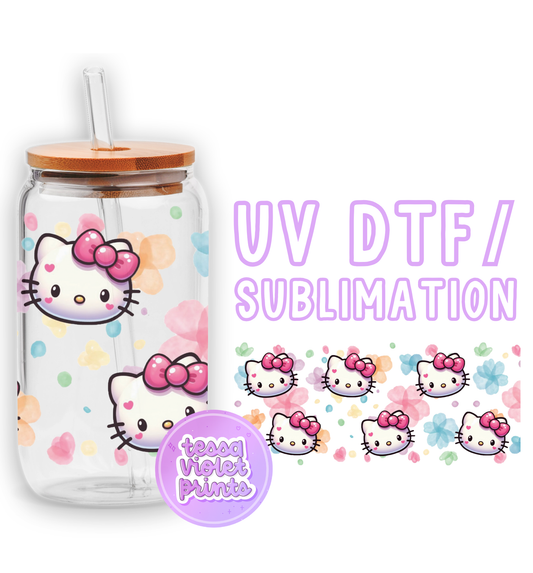 a glass jar with a hello kitty design on it