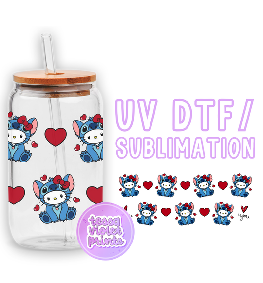 a glass jar with a straw lid and a sticker with a picture of a