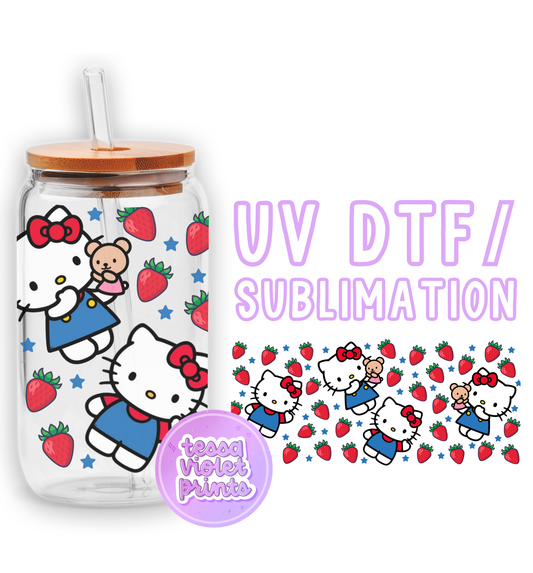 a hello kitty water bottle with strawberries on it