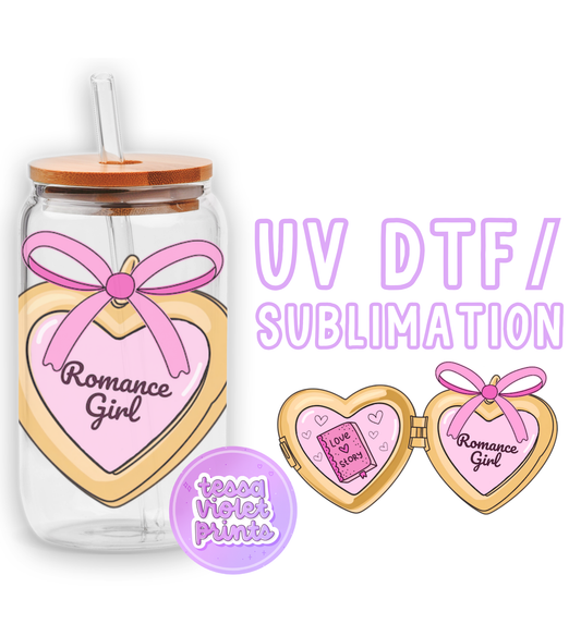 a glass jar with a pink bow and two hearts