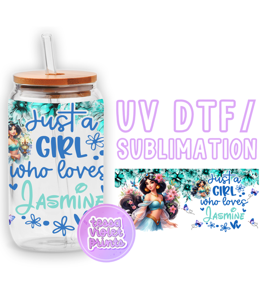 a glass jar with a straw lid and a sticker with a picture of a