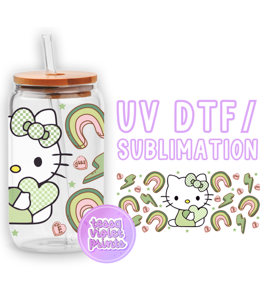 a hello kitty water bottle with a hello kitty sticker next to it