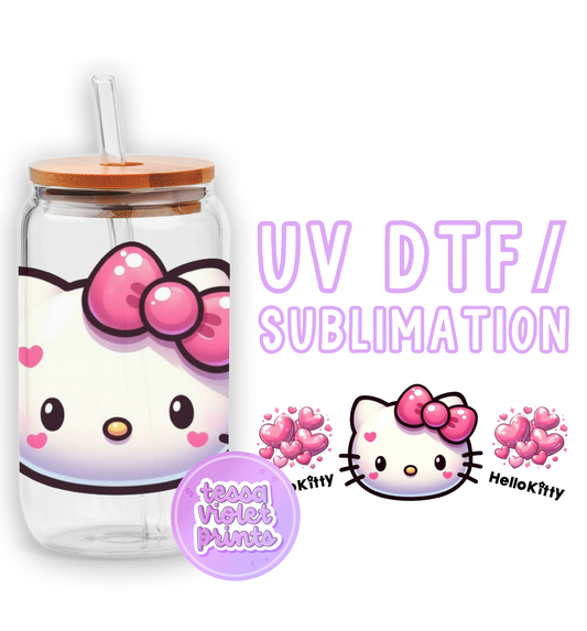 a glass jar with a hello kitty design on it