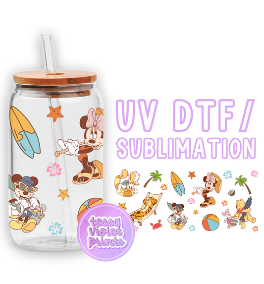 a glass cup with a straw lid and mickey mouse stickers on it