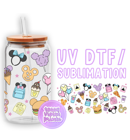 a glass cup with a straw lid and a sticker on it