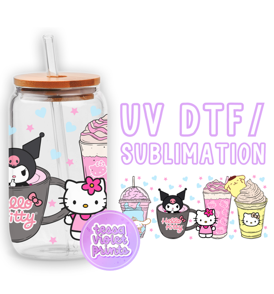 a glass cup with a hello kitty design on it